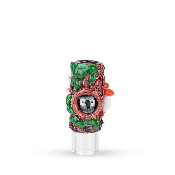 Center-front view of the Hose Tip Renew the Redwoods showing a sculpted tree-trunk design with a hollow owl face, green moss accents, and small red mushrooms.