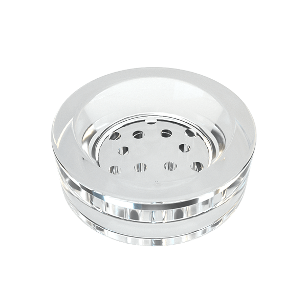 Top-down view of the clear Glass Liner showing its shallow bowl and perforated metal insert against a white background.