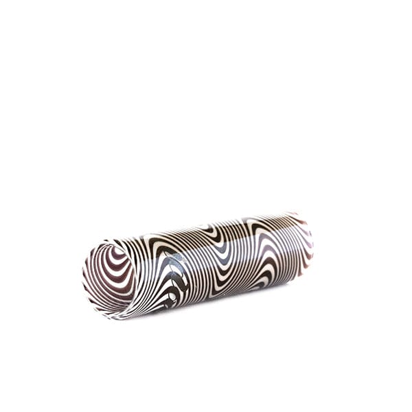 Angled close-up of the black-and-white swirled iDab Glass Hookah Hose Tip (Black + White) resting on a white background.