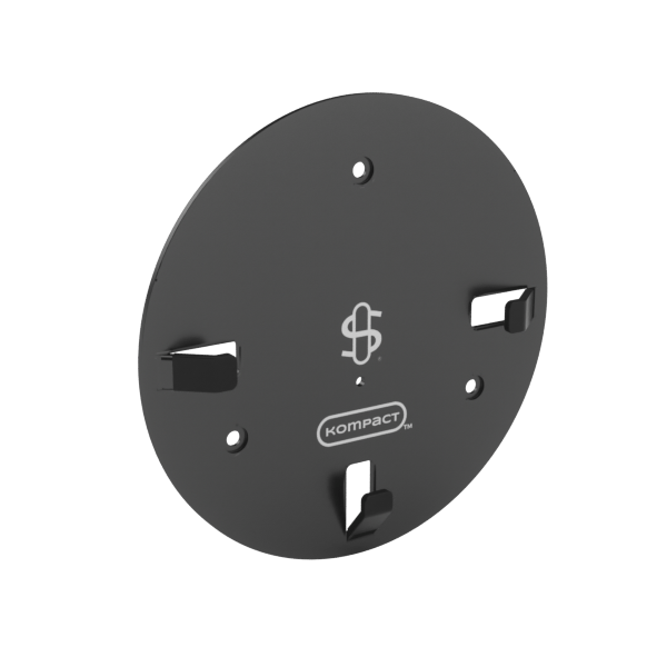 Angled view of the black Kompact Wall Mount showing its round plate, cutouts, mounting holes, and stamped Kompact logo.