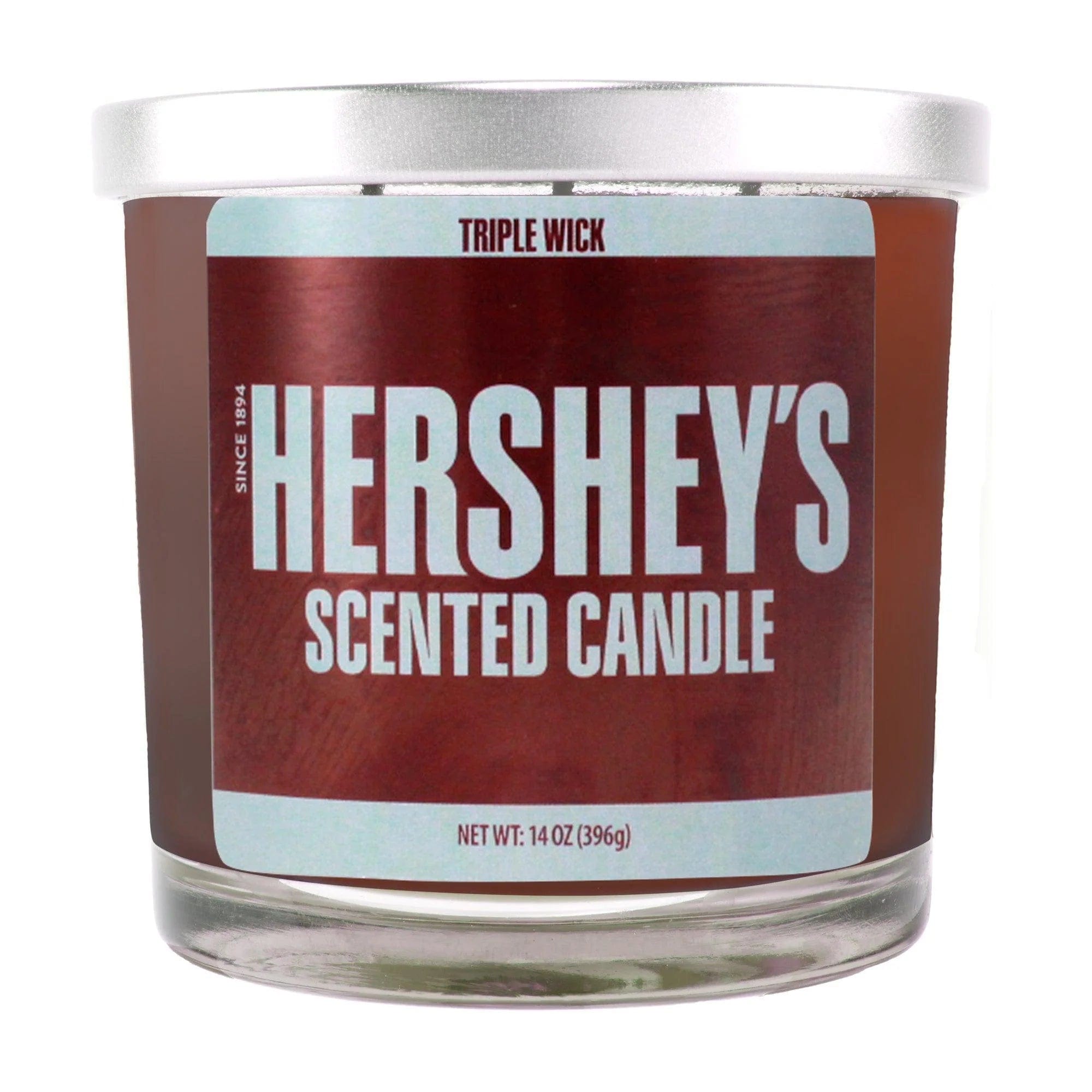 Close-up front view of the 14oz Candy Scented Candles jar showing a silver lid, brown label with large "HERSHEY'S" text, and clear glass base.