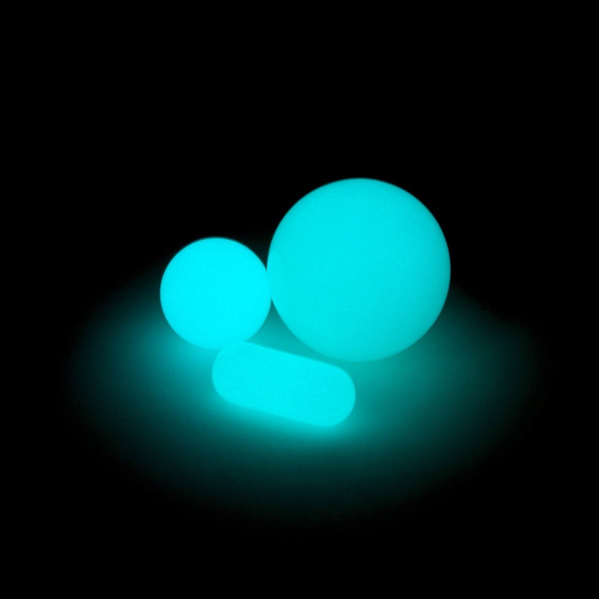 A close-up, angled view of the Glow in The Dark Glass Terp Slurper Set, showcasing its luminous, glowing quality.