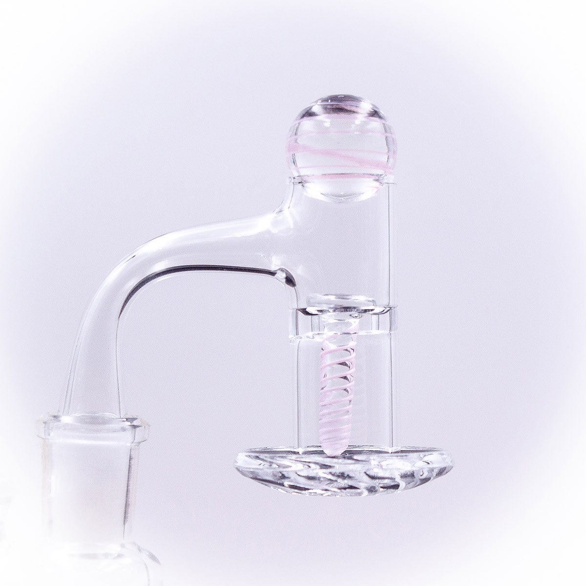 A close-up, angled view of the Glass Terp Screw and Marble Slurper Cap Set, displaying the clear glass pieces against a neutral backdrop.