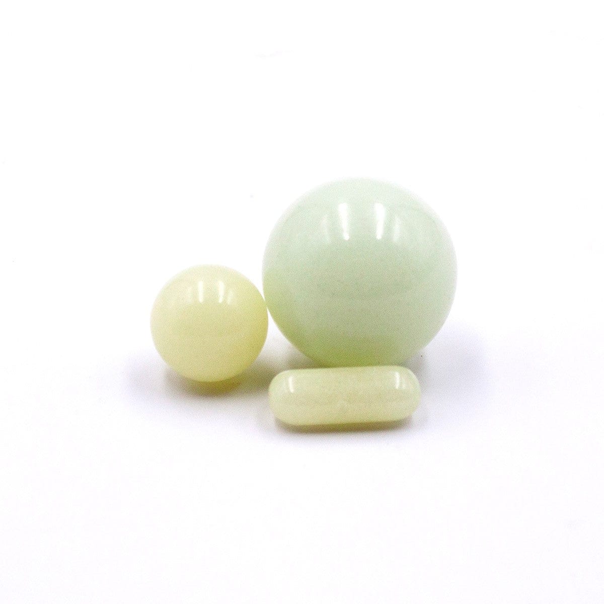 A close-up, angled view of the Glow in The Dark Glass Terp Slurper Set, showcasing the smooth glass construction.