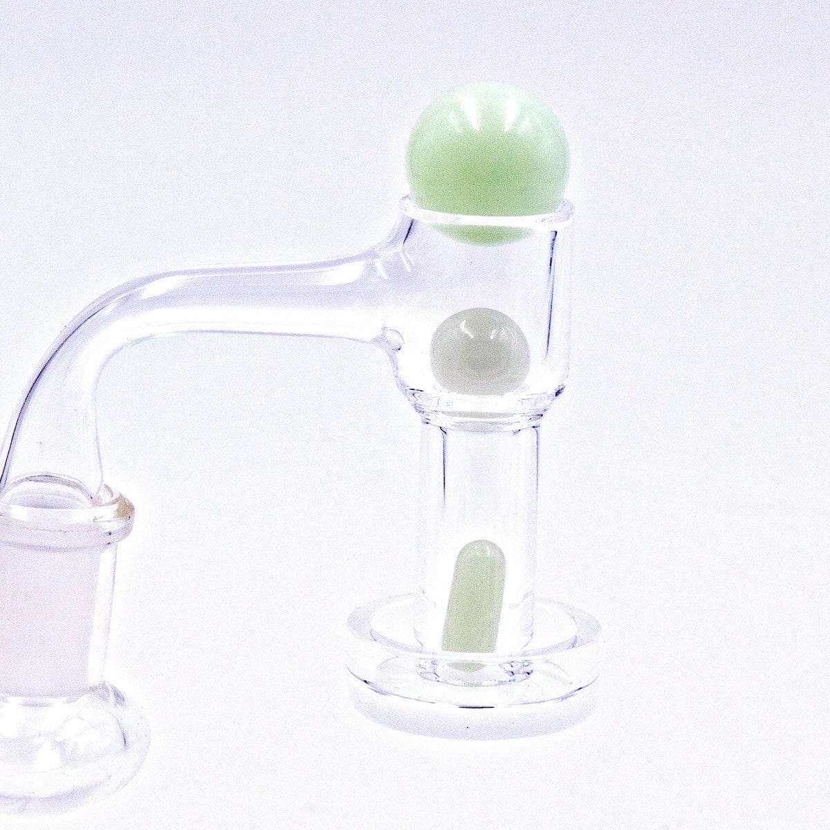 Front view of the Glow in The Dark Glass Terp Slurper Set, showing its clear glass construction and circular base.