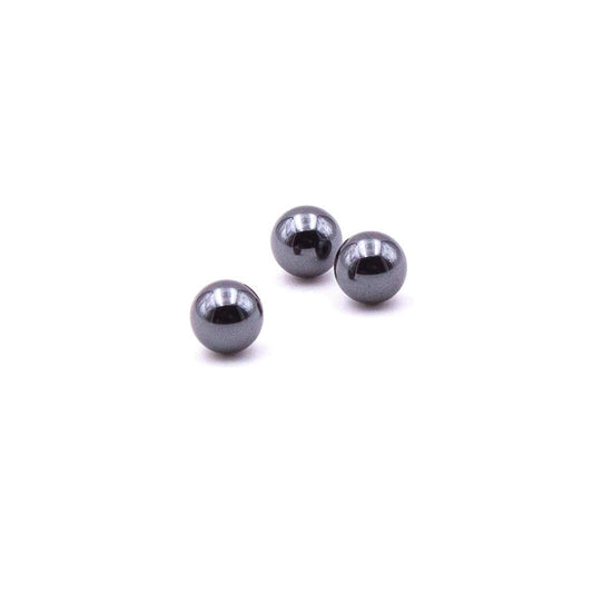 Silicon Carbide Terp Pearls displayed as a close-up, high-angle shot of three spherical, reflective objects on a plain white background.