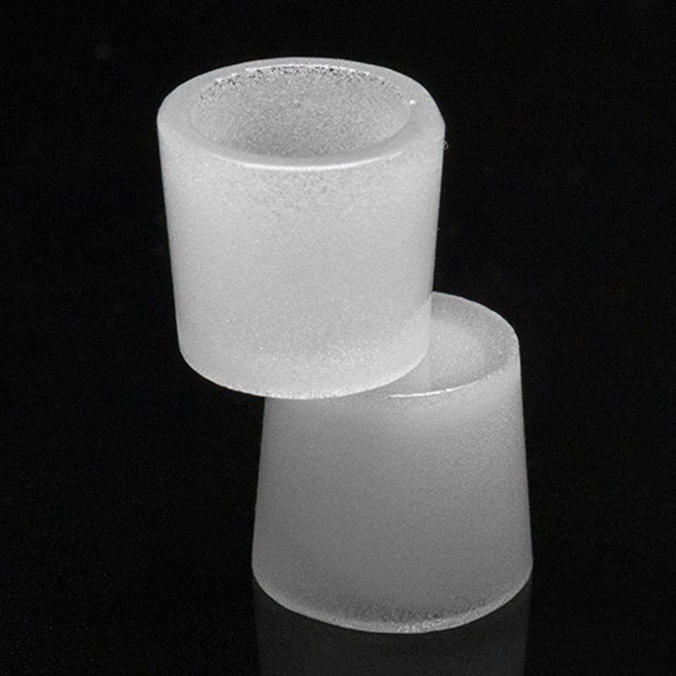 A close-up, angled view of the Puffco Peak Gavel Bowl, displaying its simple, rounded form on a dark background.