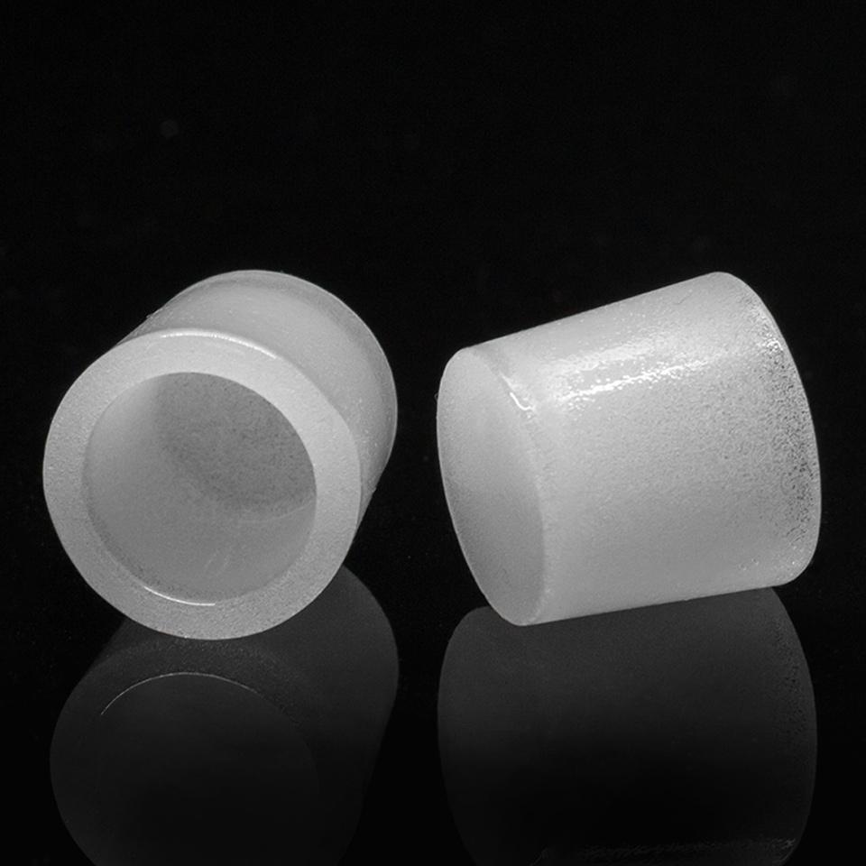 A studio shot displays the Puffco Peak Gavel Bowl, a ceramic bowl reflecting light on a dark surface.