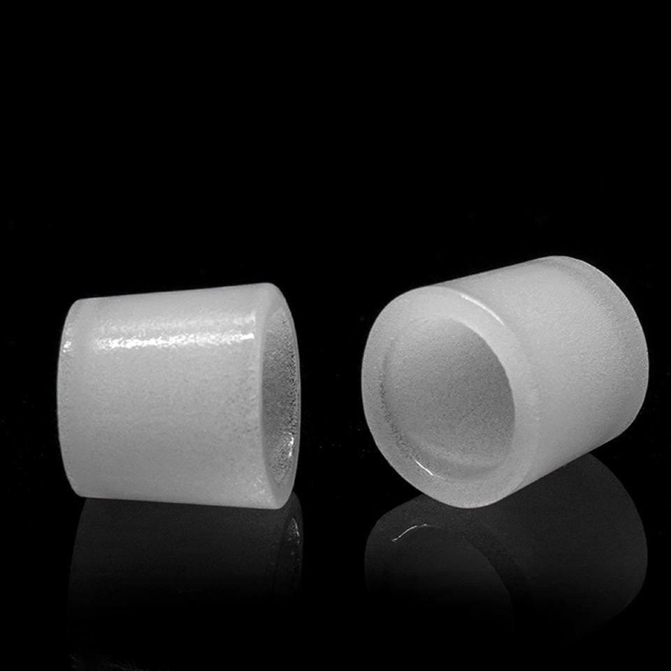 A close-up shot of the Puffco Peak Gavel Bowl, featuring a smooth, clear glass design against a dark, reflective surface.