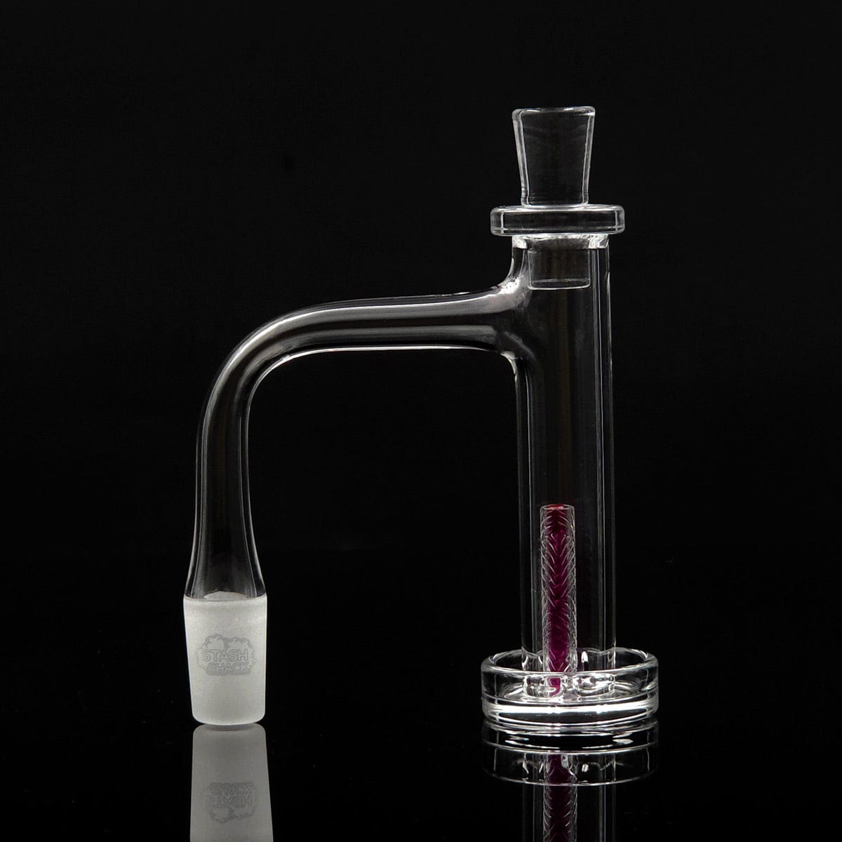 A studio shot displays the Quartz Tower Full Weld Banger Set with Quartz Cap, featuring a ruby core within the clear quartz pillar.