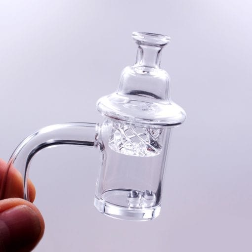 Close-up of the Quartz Banger Set with Spinning Carb Cap and Terp Pearls, showing the clear glass banger with visible terp pearls inside.