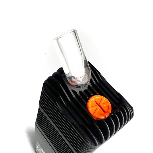 A close-up shows the Venty Vaporizer Glass Mouthpiece inserted into a textured black vaporizer body, viewed from a slightly angled perspective.