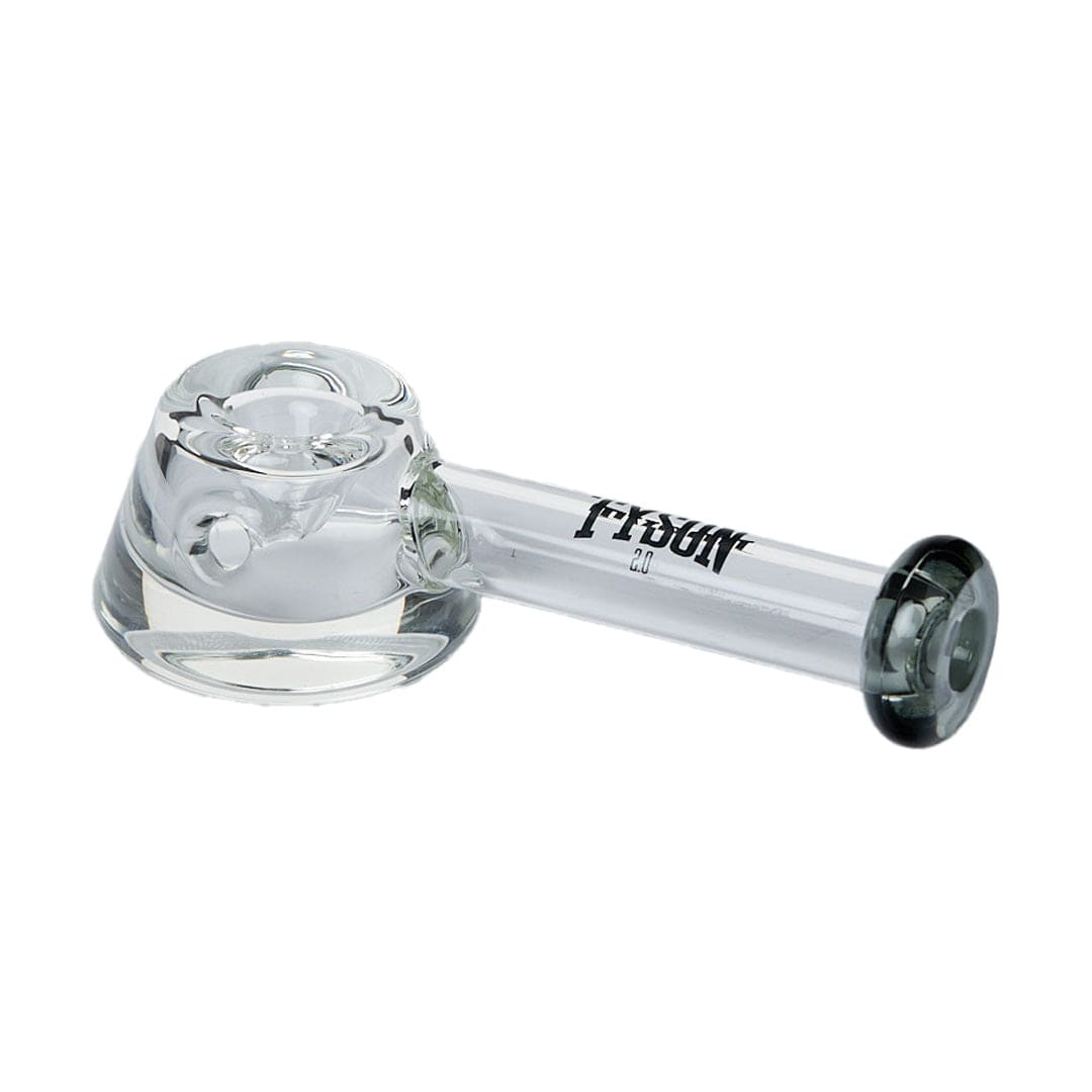A side view of the Tyson Dynamite Hand Pipe, showcasing its curved glass form against a neutral background.