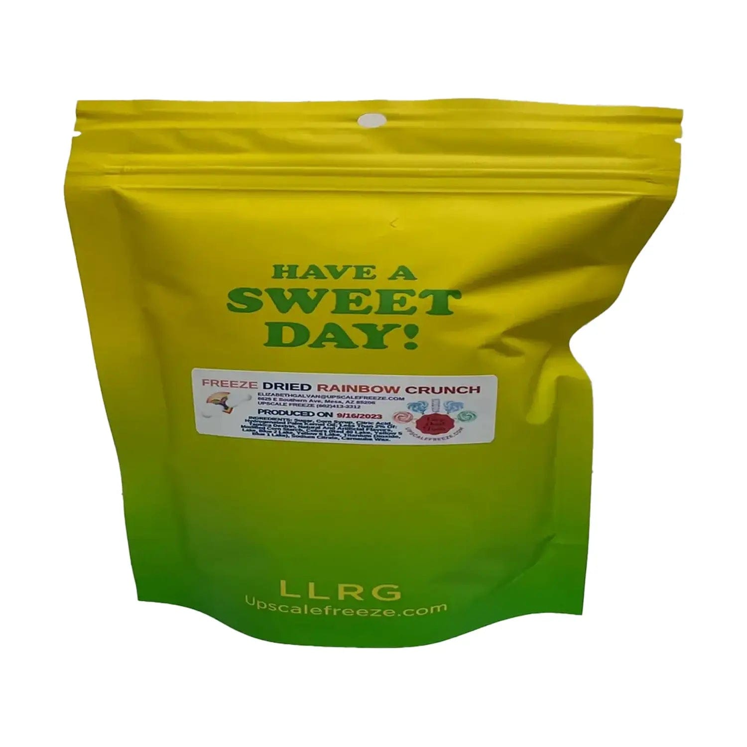 A brightly colored package of Upscale Freeze  Freeze Dried Rainbow Crunch is displayed with a diagonal text overlay reading “Have a Sweet Day!”