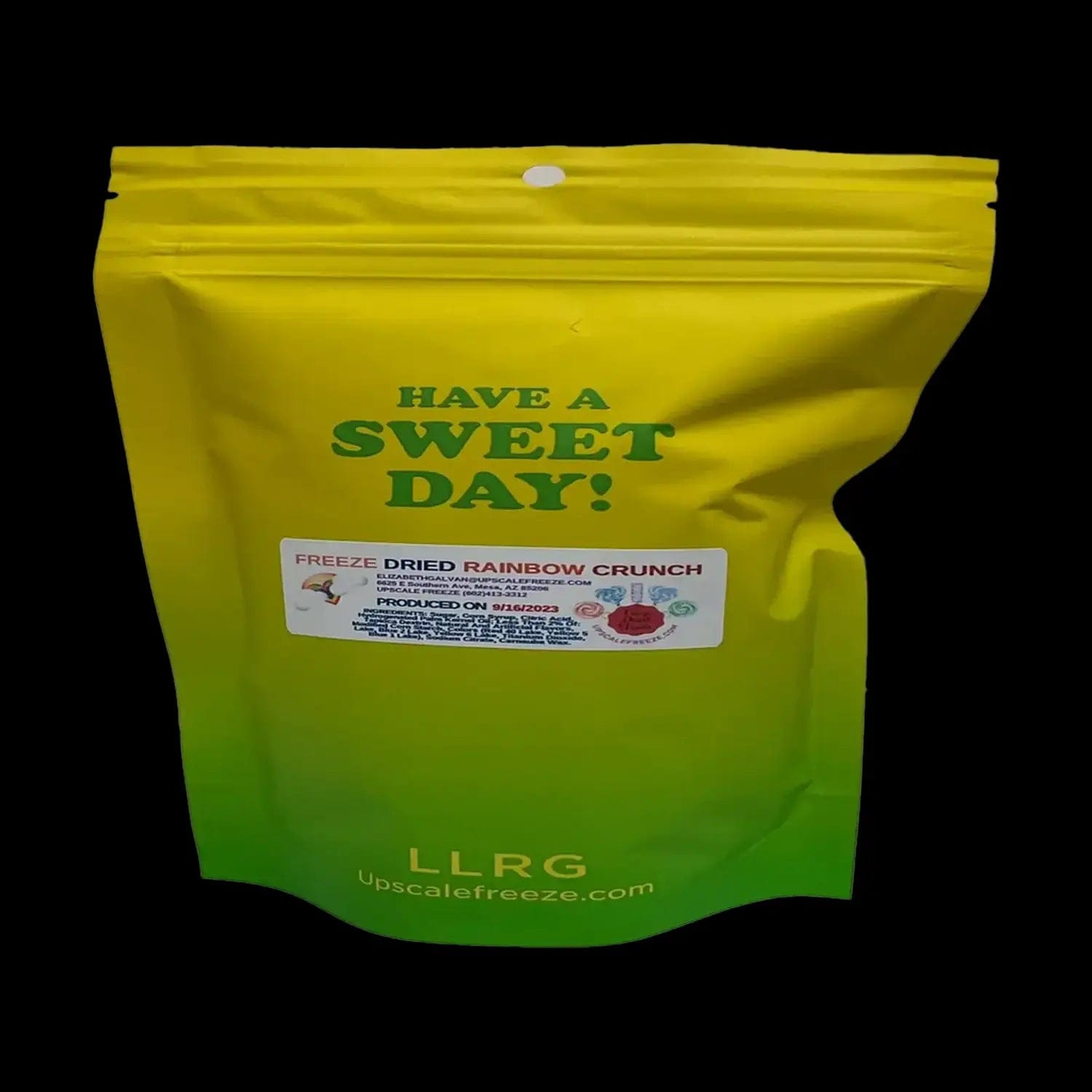 A brightly colored package of Upscale Freeze  Freeze Dried Rainbow Crunch is displayed against a black background.