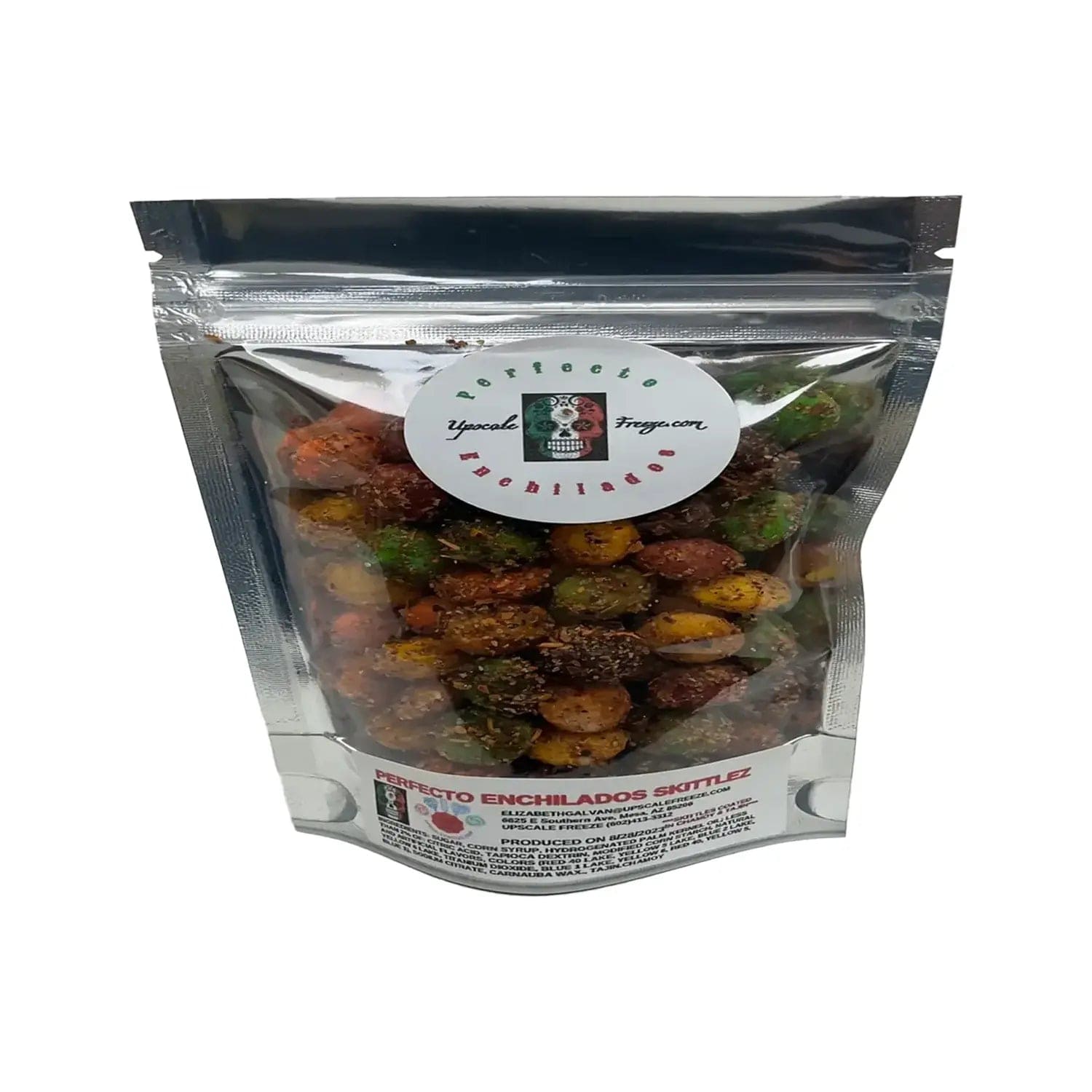 Close-up of the Upscale Freeze  Perfecto Enchilado Skittles in a clear plastic pouch, showing the candies inside.
