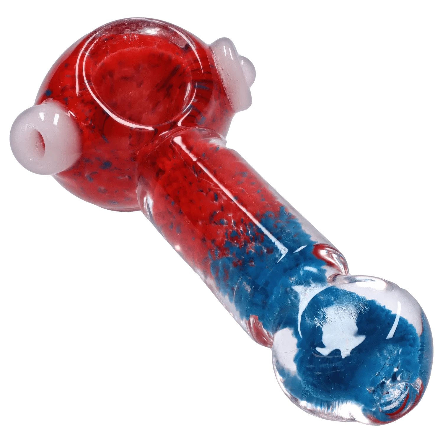 Angled close-up of the DHC Tri-Color Frit Flat Spoon Pipe - 3.5 in. showing red and blue frit pattern over clear glass and a white-rimmed bowl.