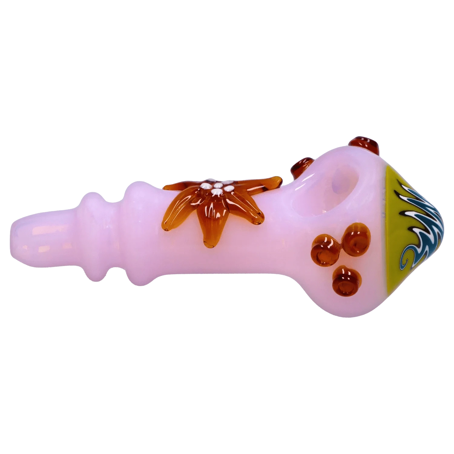 Side profile of the DHC Star Reversal Spoon Pipe - 4.5 in., a pale pink glass spoon pipe with amber floral accents and a patterned green mouthpiece.