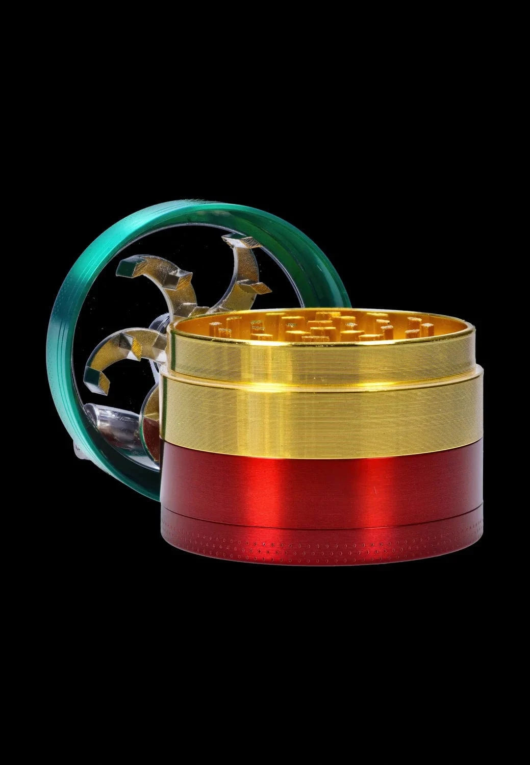 Close-up front view of the DHC 3-Stage with Handle Grinder - 52mm showing a gold toothed grinding chamber stacked on a red base with a green transparent lid and visible metal teeth.