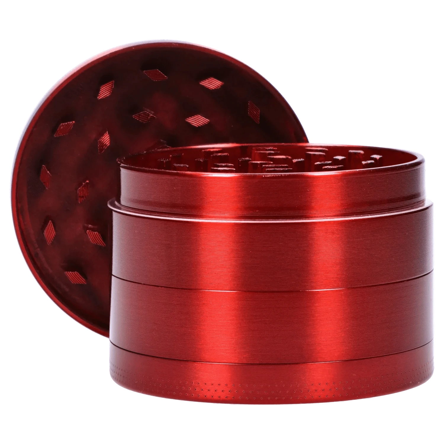 Close-up three-quarter view of the red DHC Grooved 3-Stage Grinder - 52mm with its lid propped open showing internal diamond-shaped teeth and a textured exterior.