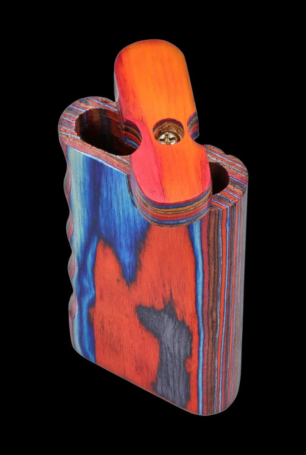 Three-quarter view of the large DHC Colourful Wood Grain Dugout - Large showing its vibrant layered red, blue and orange wood grain with the flip-top open against a black background