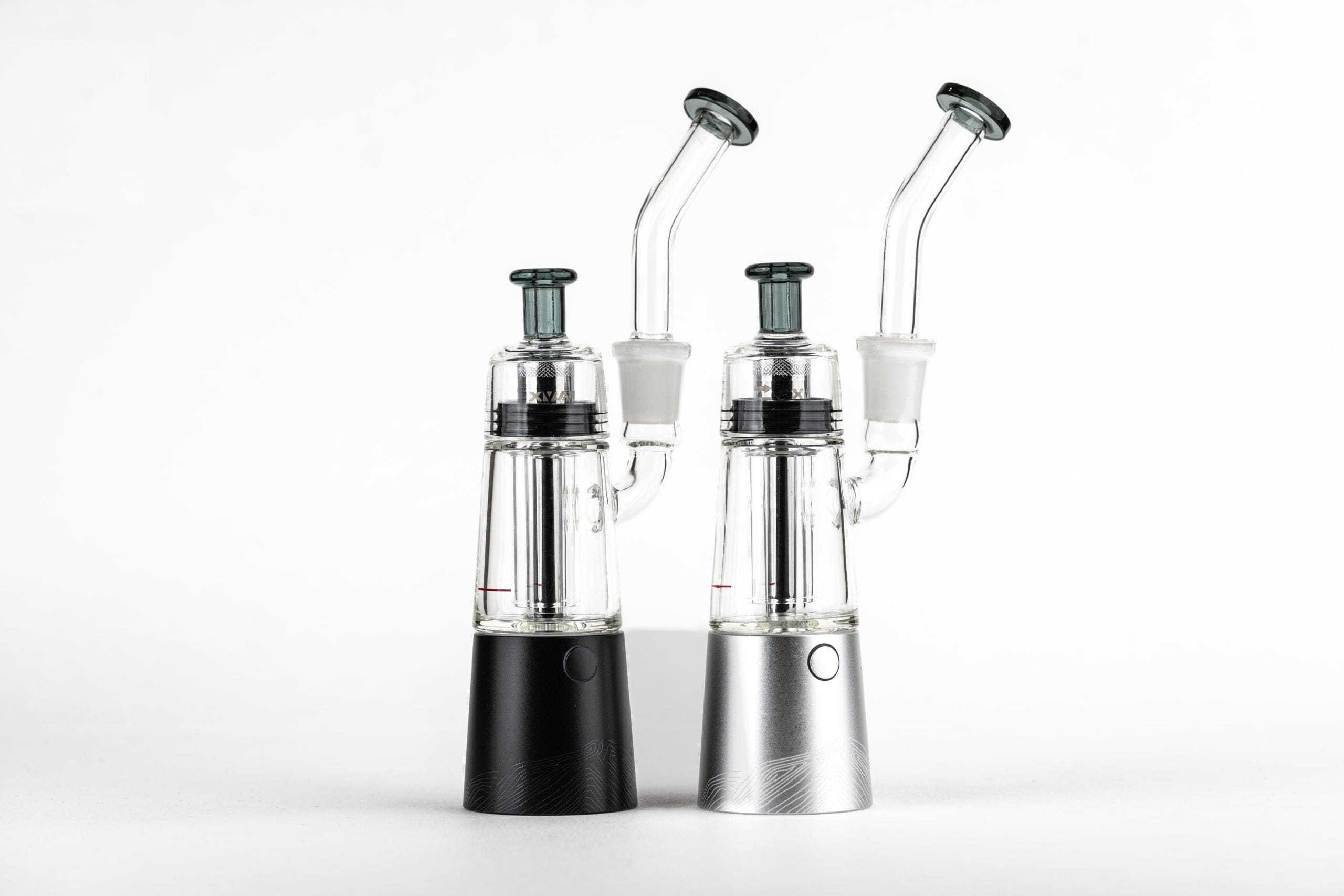 A side-by-side view of two XVAPE VISTA MINI 2 vaporizers, showcasing their silver and black finishes against a plain white background.
