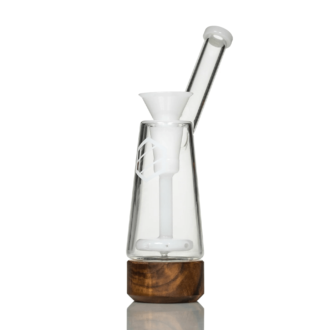 Front view of the Anomaly Drift Bubblers, showcasing the clear glass bubbler resting on a reflective surface.