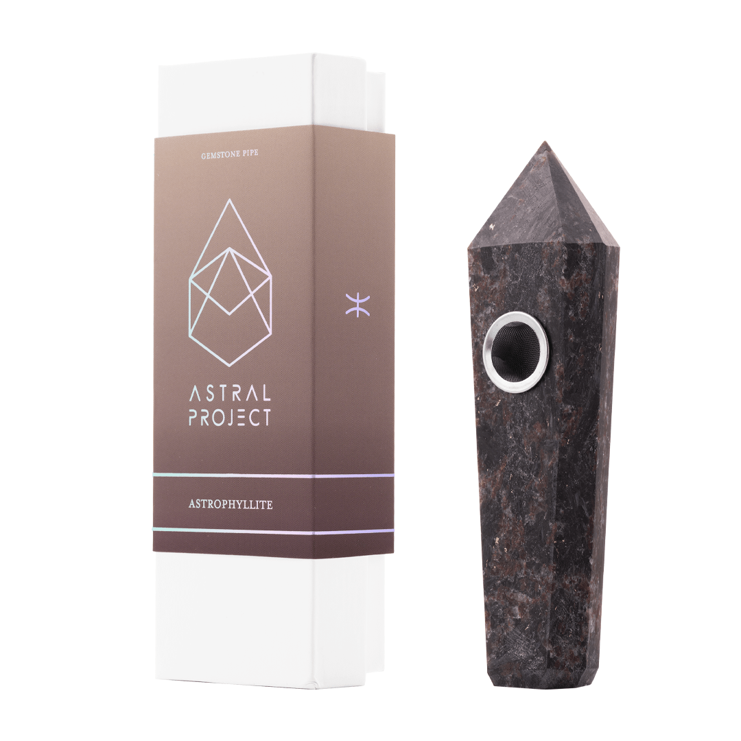 A straight-on view of the Gemstone Pipe, showcasing its unique crystalline shape and dark stone finish.
