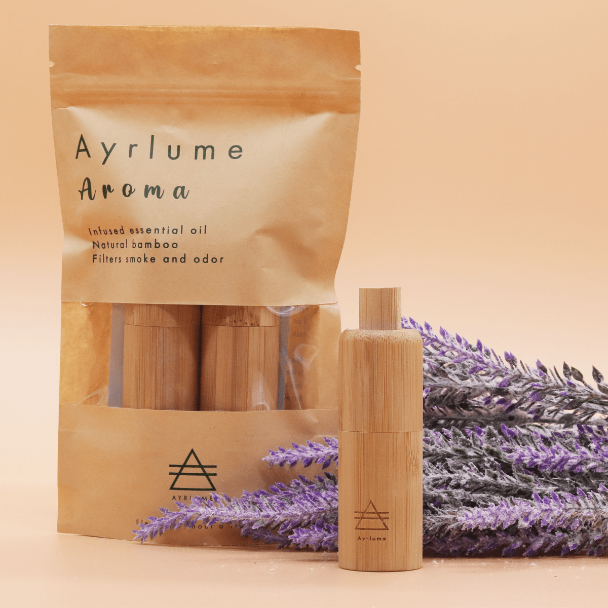 A close-up shot of the Ayrlume Personal Bamboo Air Filter Lavender Double Pack, showcasing the natural bamboo filters against a soft lavender background.