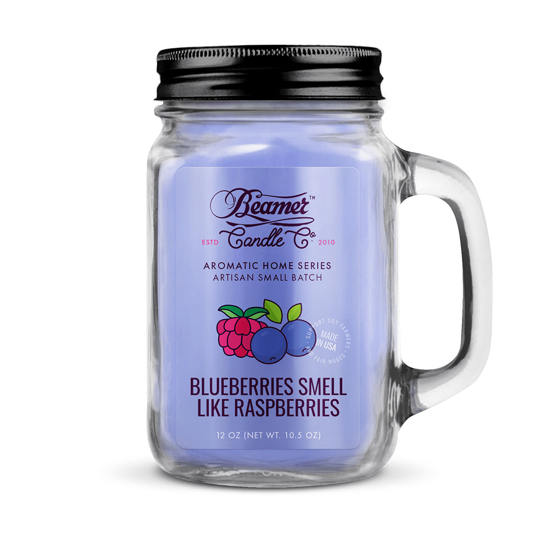 A front view of the 12oz Smoke Killer Candles in a glass jar with a label featuring the brand’s logo.