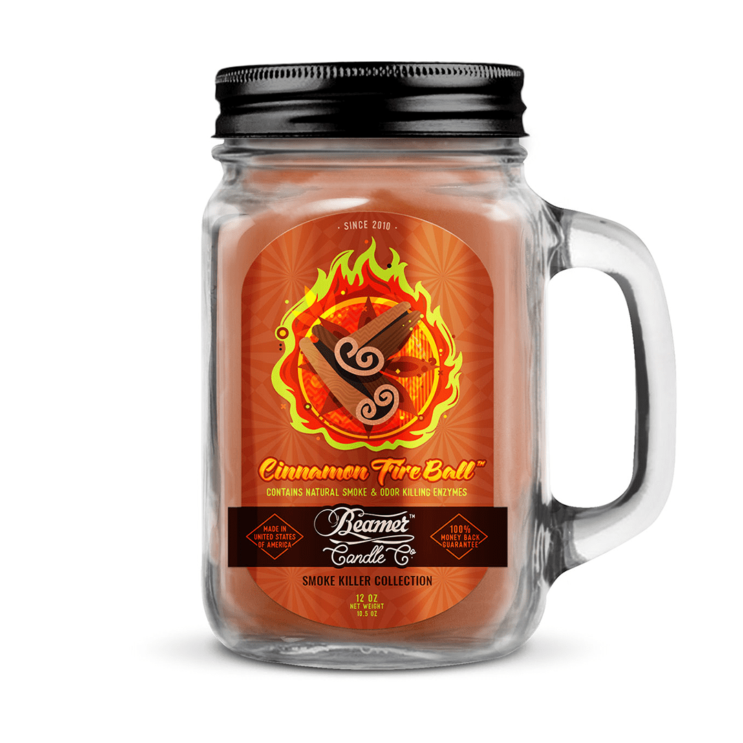 A front view of the 12oz Smoke Killer Candles in a glass container with a label displaying the brand name.