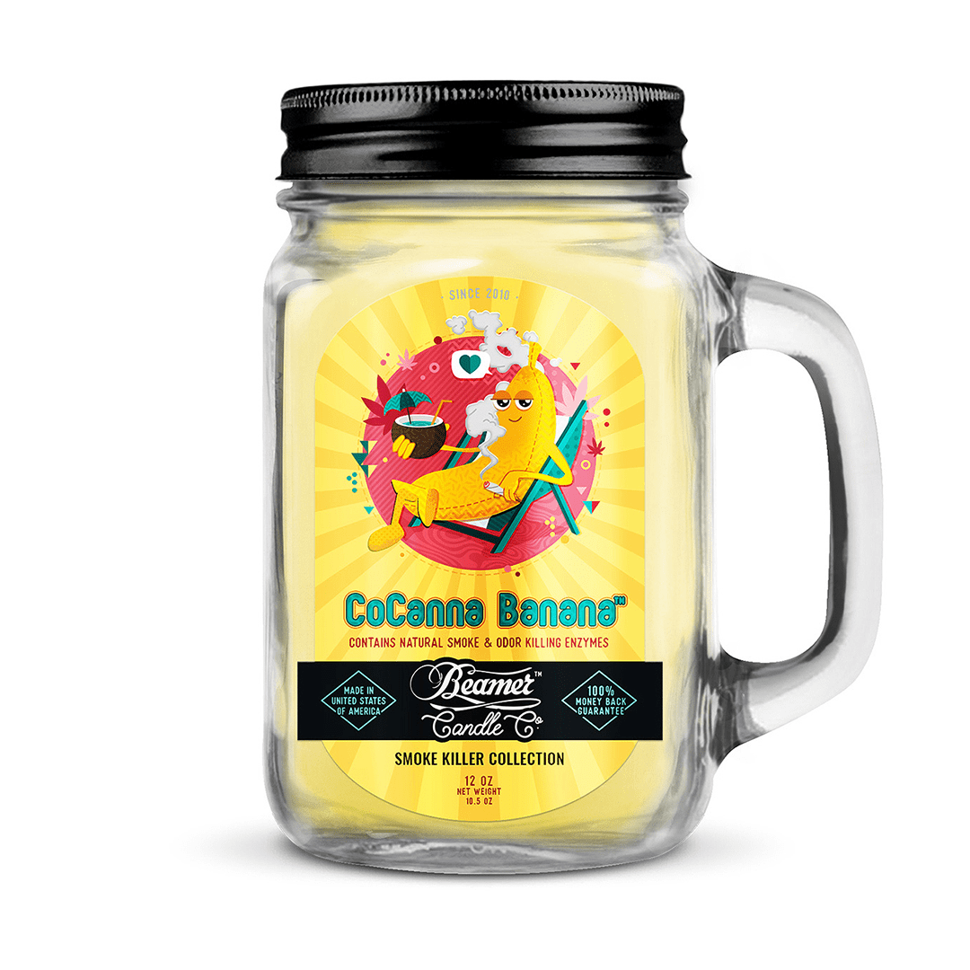 A front view of the Smoke Killer 12oz Candles in a clear glass jar with a colorful, patterned label and a wooden lid.