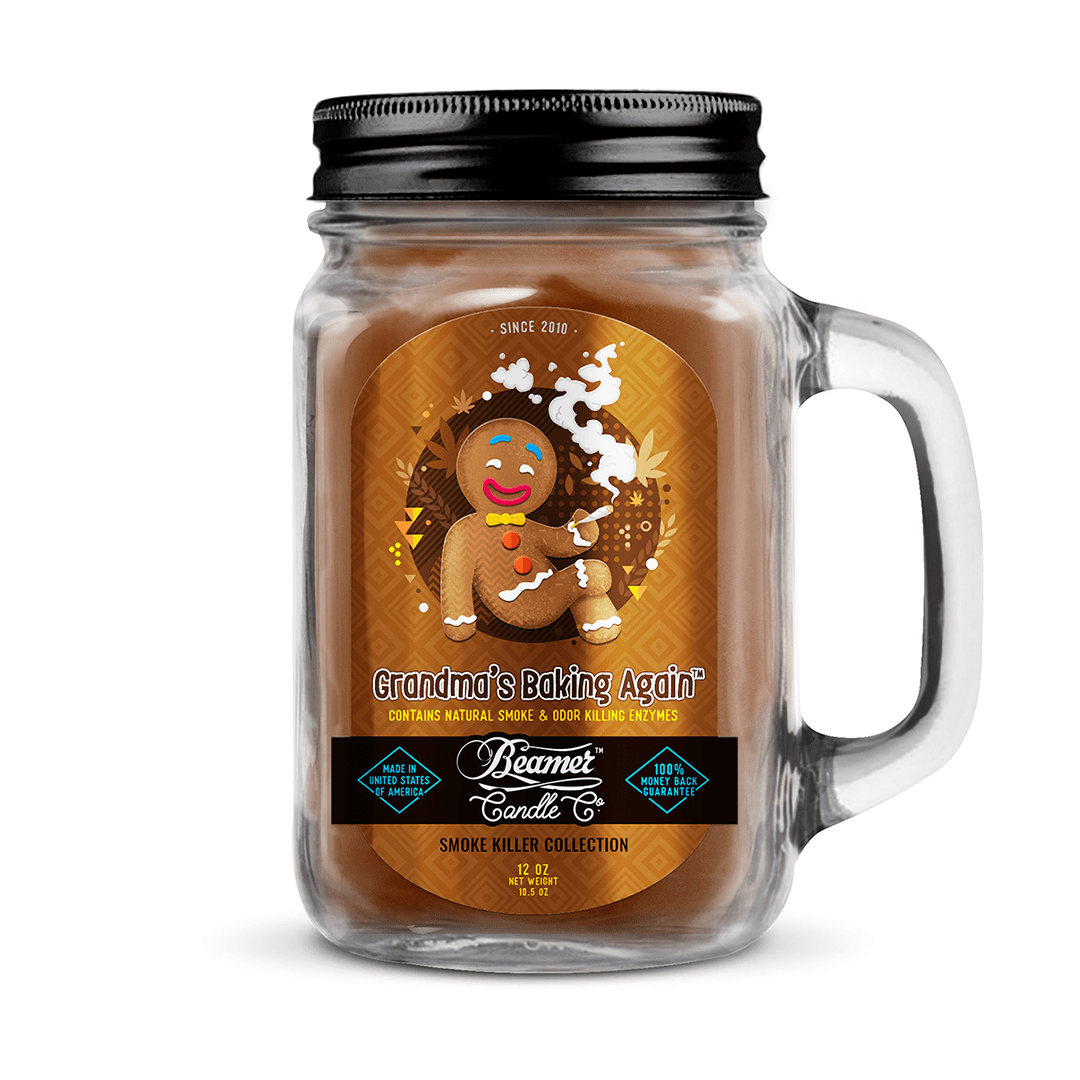 Front view of the Smoke Killer 12oz Candles in a glass jar with a vintage label design, against a dark background.