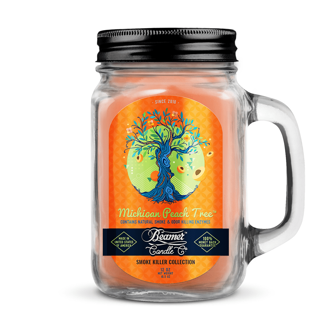 Front view of the Smoke Killer 12oz Candle with a peach design on a label, centered on a white jar.