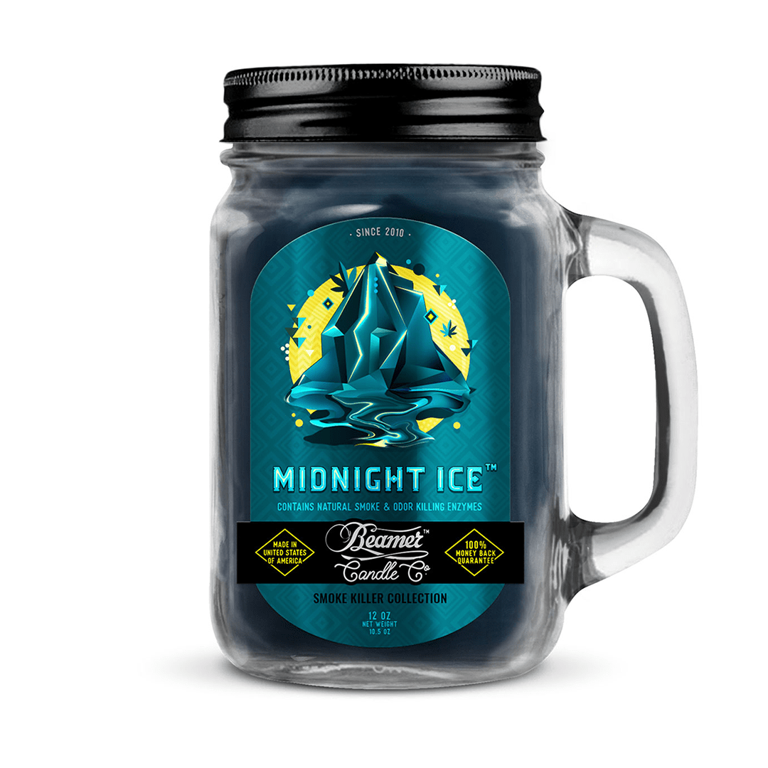 A close-up of the Smoke Killer 12oz Candle with a dark, icy blue label, set against a black background.