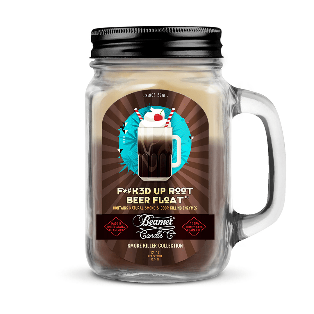 A centered, eye-level shot of the Smoke Killer 12oz Candle in a clear glass jar with a decorative label against a dark background.