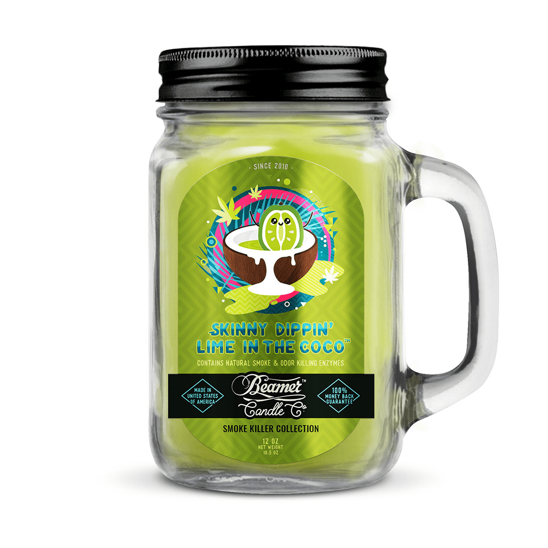 A front view of the 12oz Smoke Killer Candles jar, displaying a colorful, illustrated label with unique text and designs.