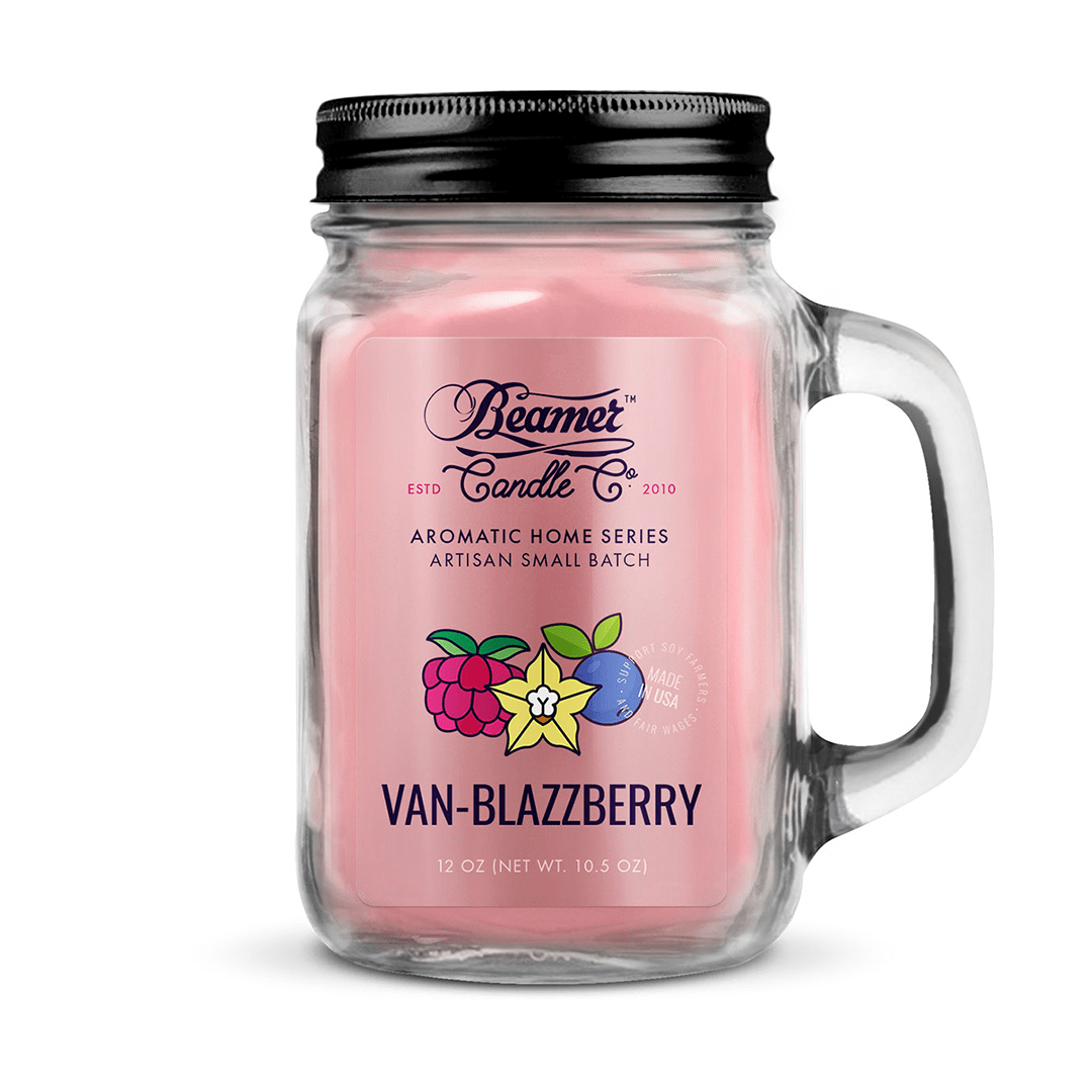 Front view of the Smoke Killer 12oz Candles in a glass jar with a label showing a floral design.
