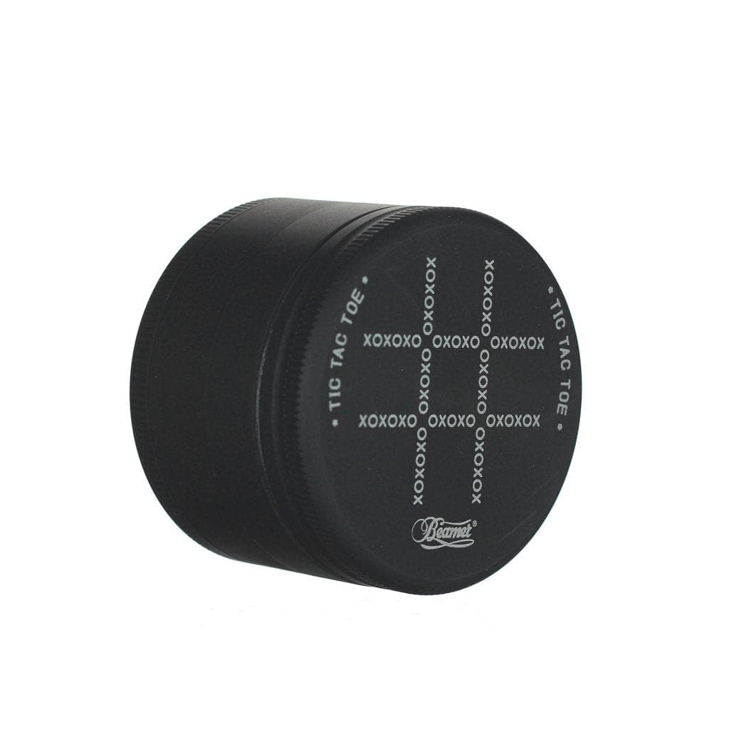 Close-up of the Beamer Aircraft Grade Aluminum Grinder, showcasing its metallic texture and cylindrical shape against a dark background.