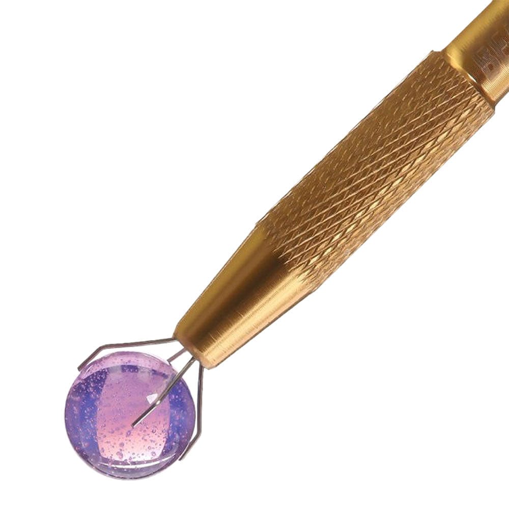 Close-up view of the Bear Quartz Bear Claws Grab Tool, showing the textured grip and claw-like end.