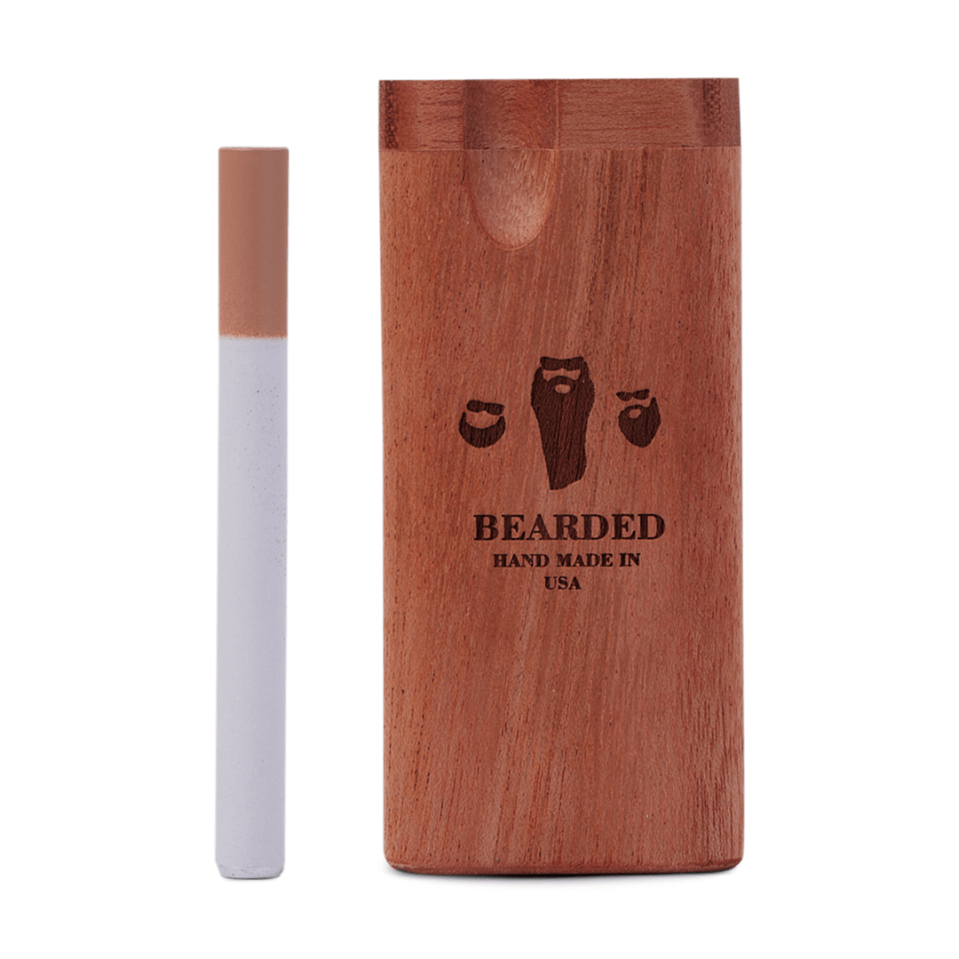 Front view of the Bearded Classic Dugout, a dark wood case with a visible cigarette resting alongside it.