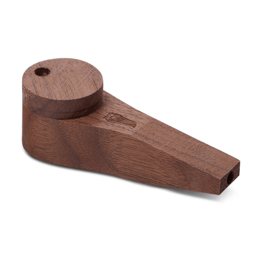 A side view of the Bearded Circle Wood Pipe with Lid, showing its smooth, dark wood finish and capped opening.