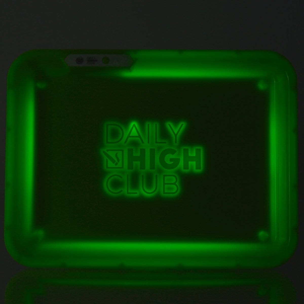 Overhead view of the GlowTray x Daily High Club Rechargeable LED Rolling Tray, illuminated with a bright, even glow.