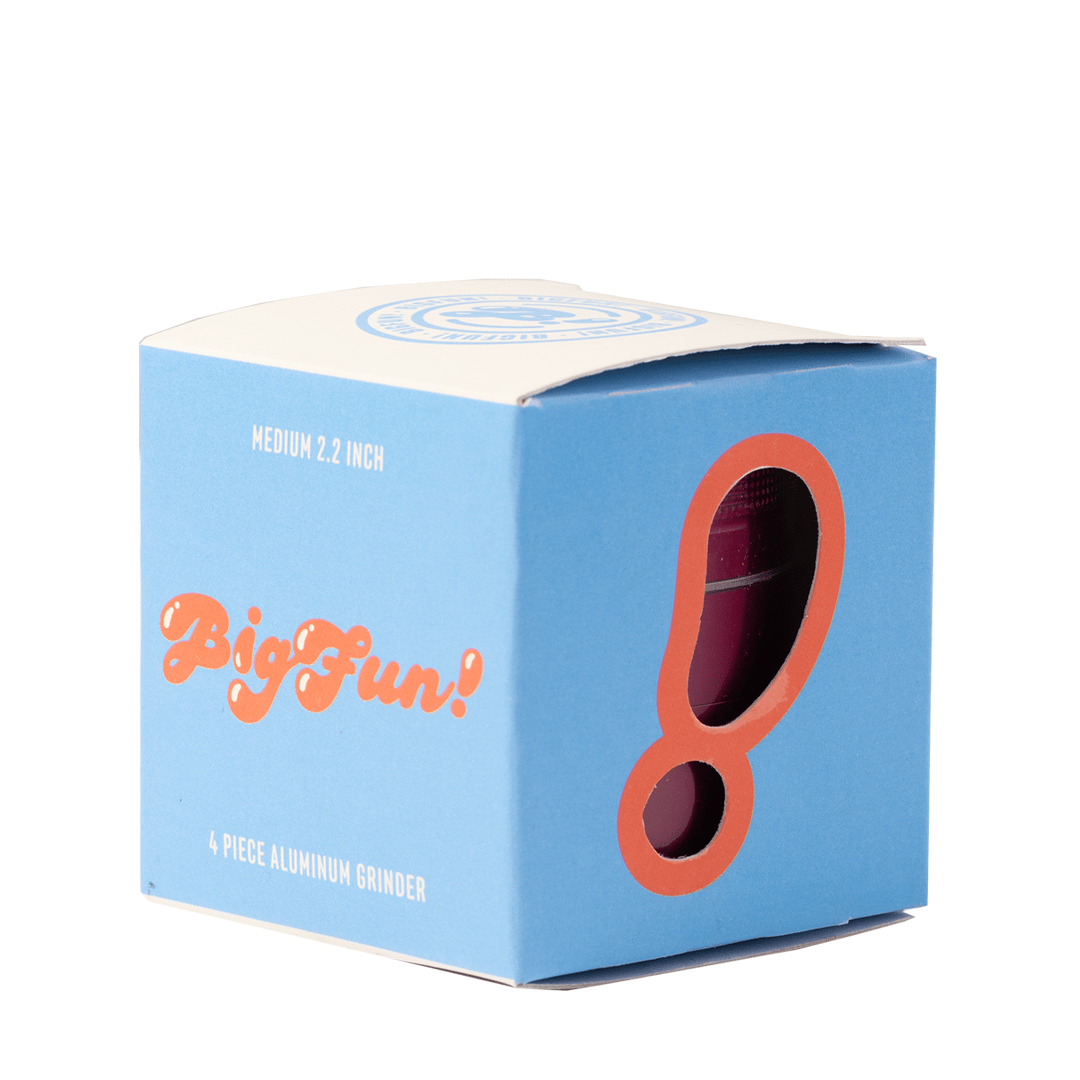 Front view of the BIGFUN! Medium Grinders, a white cylindrical grinder with a visible interior chamber.