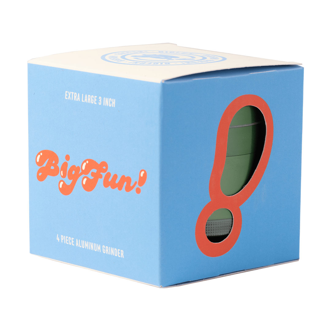 A front view of the BIGFUN! XL Grinders, showcasing its red, cylindrical shape against a light background.