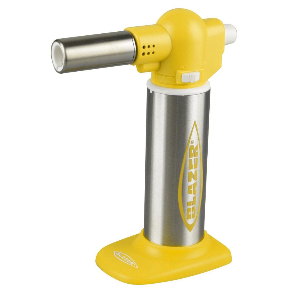 A front view of the Blazer Big Buddy Torch Lighter with a silver body and yellow flame adjustment dial.