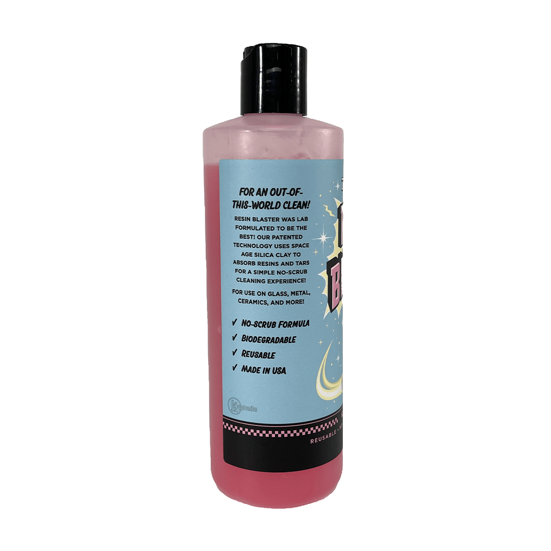 Front view of the Blazy Susan Resin Blaster Glass Cleaner bottle, featuring bold text on a vibrant, colorful label.