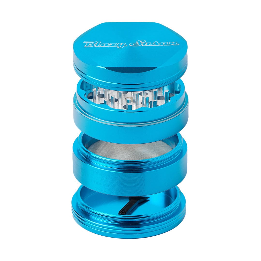 A close-up, angled view of the Blazy Susan Grinders with silver teeth visible between the blue grinder pieces.