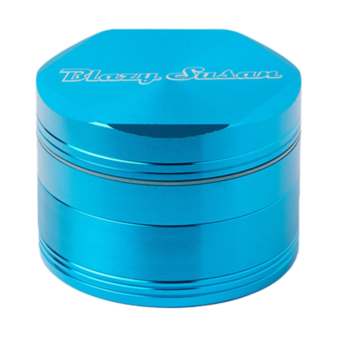 A close-up, angled view of the Blazy Susan Grinders, showing its cylindrical shape and metallic finish.