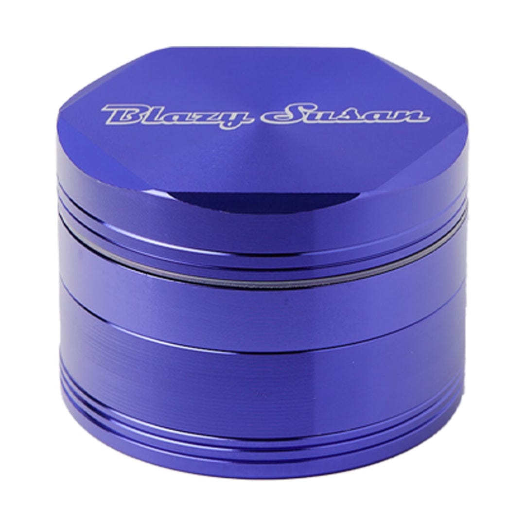 A close-up, angled view of the Blazy Susan Grinders, showcasing its metallic blue, multi-tiered cylindrical design.